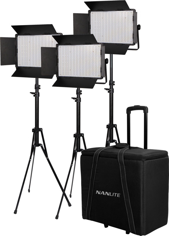 The NANLITE 3 Light Kit 900CSA, with barn doors, is mounted on pedestals and placed behind a black trolley housing with handles and wheels, all against a white background.
