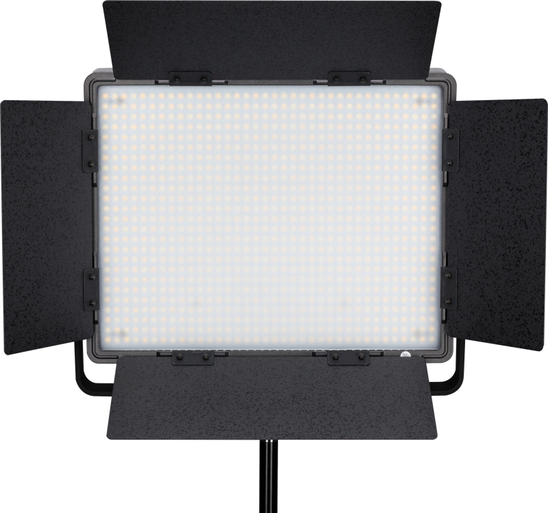 The NANLITE 900CSA Bicolor LED Panel, a rectangular studio luminaire with four adjustable black barn doors, is mounted on a pedestal and displayed forward facing with LEDs illuminated.