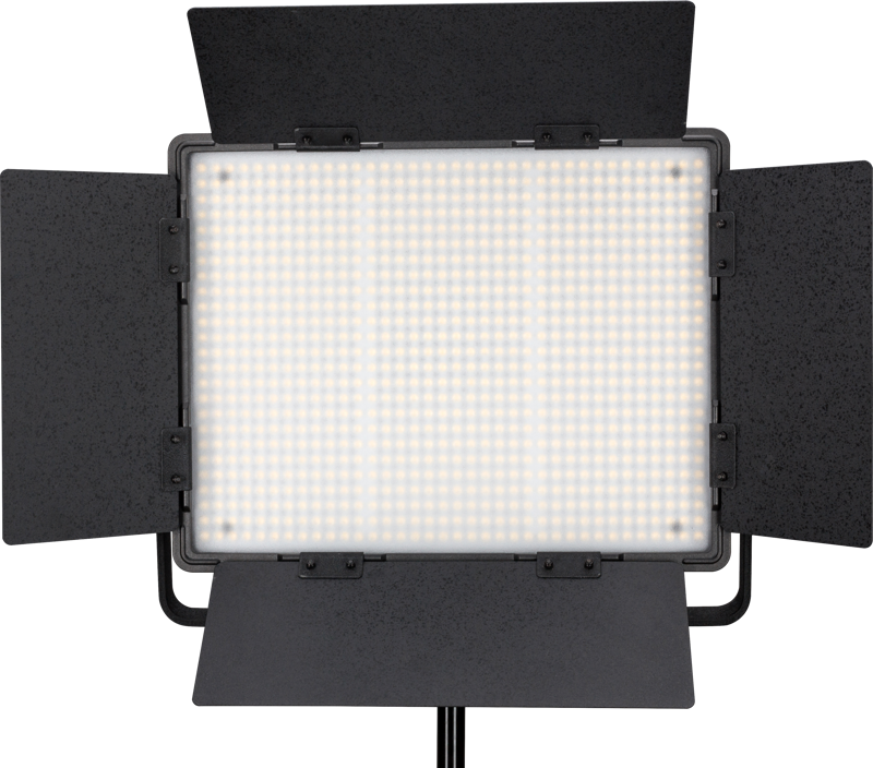 The NANLITE 900DSA 5600K LED panel with DMX control, with four adjustable black barn doors, is mounted on a stand, illuminated and facing forward against a plain background.