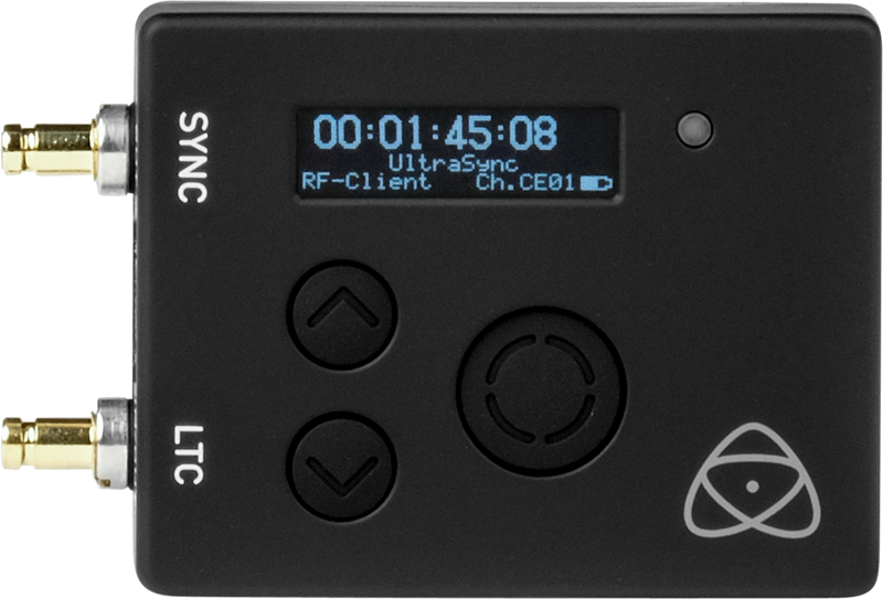 The black ATOMOS UltraSync One, with a small display showing the time code and settings, labelled SYNC and LTC on the left, and four round navigation buttons below the display.