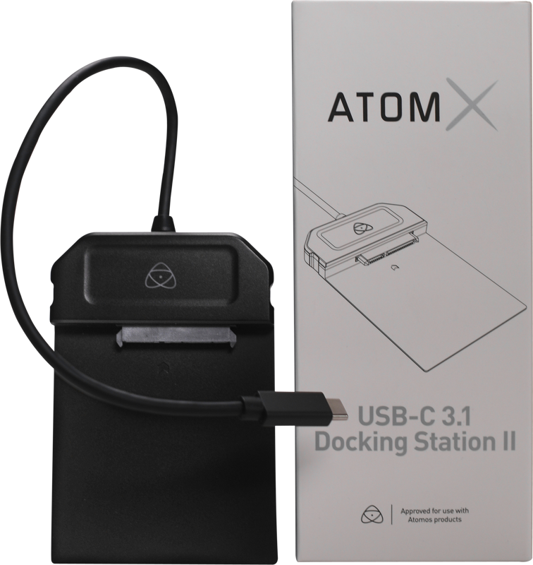The black ATOMOS AtomX USB-C 3.1 Powered Docking Station with cable is shown next to the packaging with the brand name and picture.