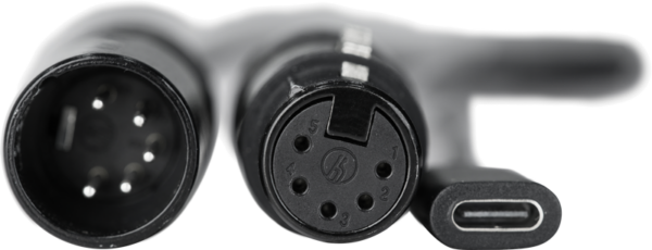 Close-up of the NANLITE USB-C to DMX Cable Splitter with 5-pin XLR male, 5-pin XLR female and USB-C connector, all side by side against a neutral background.