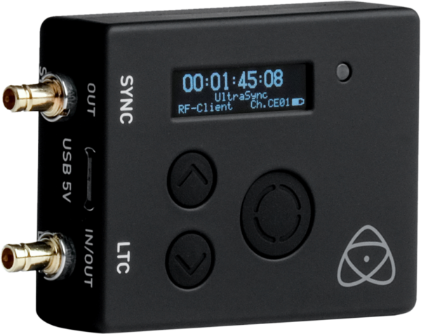 The ATOMOS Ultrasync One is a black electronic device with a small display for time and settings, round control buttons, USB port, gold-coloured input and output connectors and the Atomos logo in the bottom right corner.