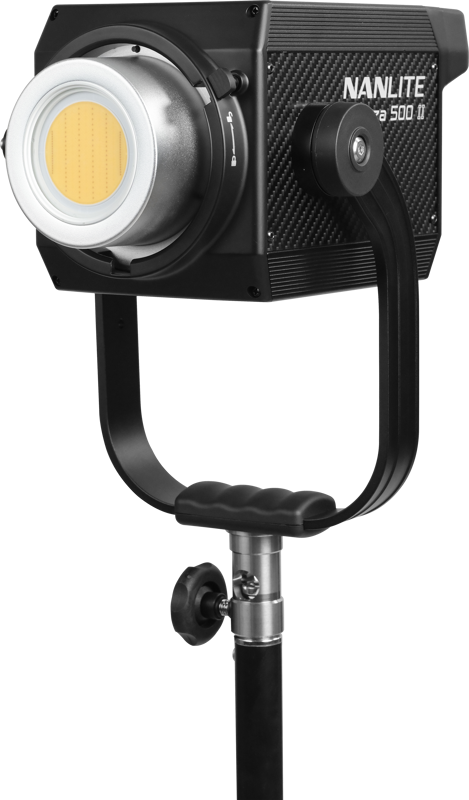 The NANLITE Forza 500 II Daylight LED Spot Light is mounted on a black base against a white background and features a large round lens, rectangular black housing and control knobs.