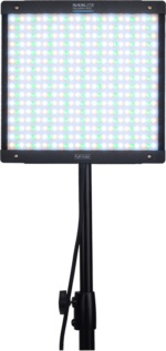 The NANLITE PavoSlim 60C RGBWW LED panel is a rectangular light with blue, green and white LED lights mounted on a black adjustable stand with power cord.
