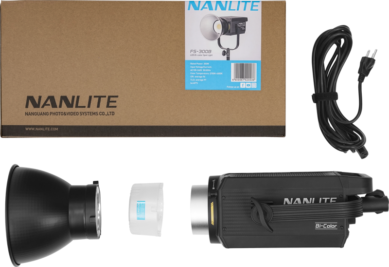 800q-03_119722 NANLITE FS-300B LED Bi-color Spot Light -LED-valopakkaus näkyy valkoisella pohjalla, jossa laatikko, virtajohto, LED-valoyksikkö, heijastin ja diffuusori ovat siististi järjestyksessä.
