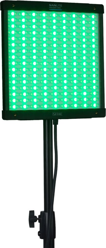 NANLITE PavoSlim 60C RGBWW LED panel, a rectangular light on a stand, displays bright green with a grid of individual LEDs and has a wire hanging from the back.