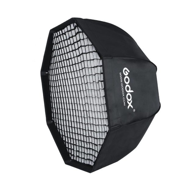 The Godox SB-GUE120 Umbrella Softbox Bowens 120cm with Grid is a black, octagonal photographic softbox; the Godox logo and website appear on its side.