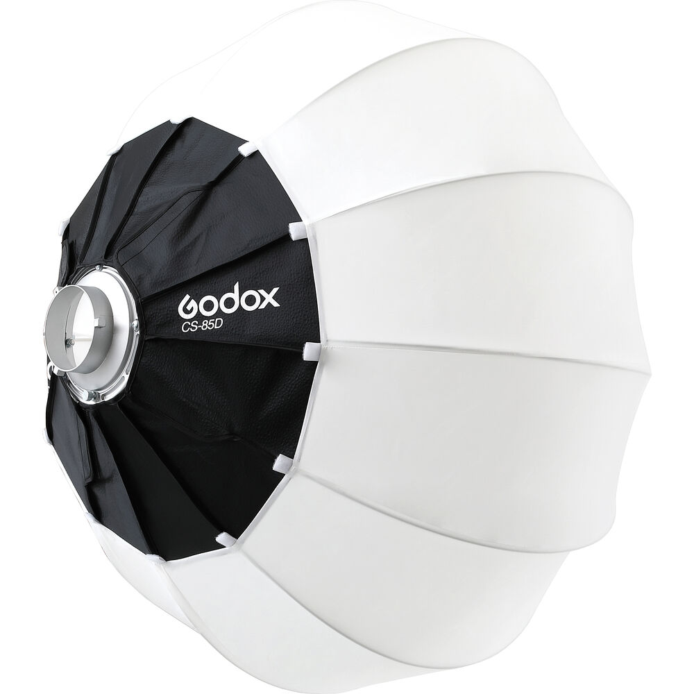 The Godox CS85D Lantern Softbox 85cm features a silver mounting ring, black back panel and white curved diffusion panels, ideal for studio lighting.
