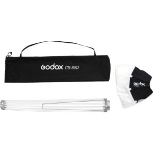 The Godox CS85D Lantern Softbox 85cm package includes a black carrying case, a foldable metal frame and a folded white and black fabric diffuser, all on a white background.
