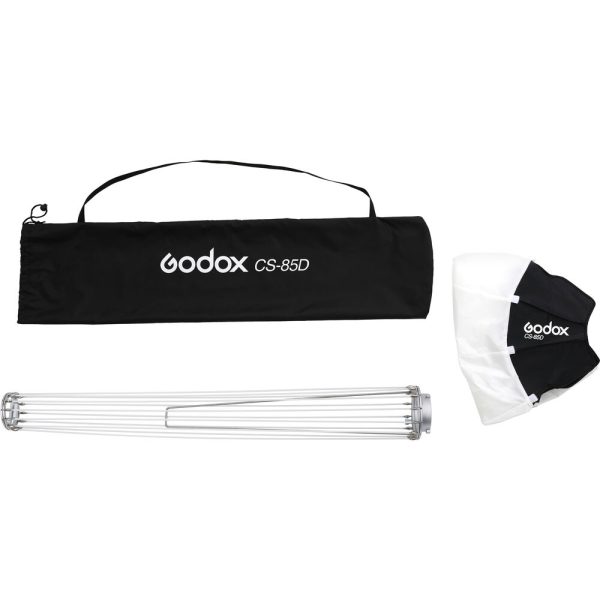 The Godox CS85D Lantern Softbox 85cm package includes a black carrying case, a foldable metal frame and a folded white and black fabric diffuser, all on a white background.