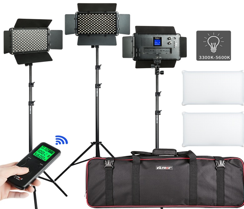 The Viltrox VL D640T LED Light Triple Kit includes three LED studio lights with stands, two white diffusers, a remote control and a black carrying case. One of the lights displays a digital display on the back and supports a colour temperature range of 3300K-5600K.