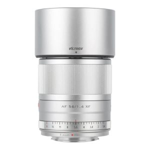 Silver Viltrox AF 56mm f/1.4 Fuji X lens The Fuji X lens is shown upright with a ribbed focus ring, aperture markings and X-mount marking on the front.