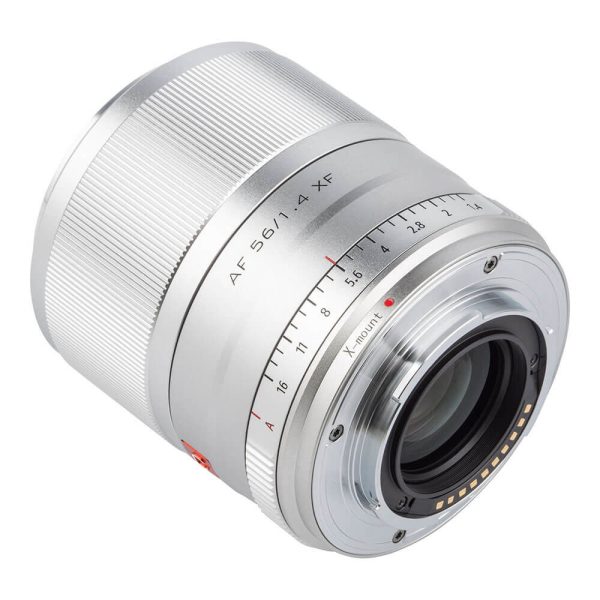 The silver Viltrox AF 56mm f/1.4 lens for Fuji X features engraved markings, a focus ring, aperture scale and visible electronic contacts on the mount side.