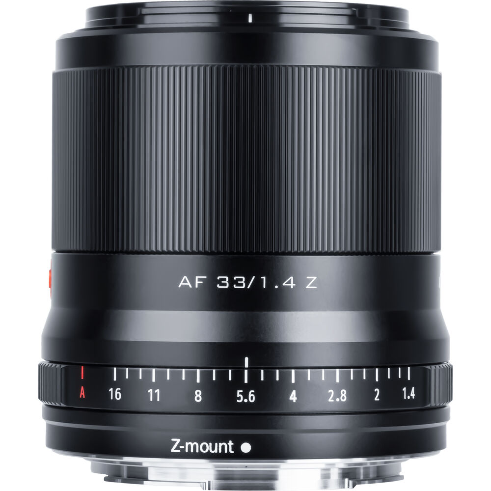 Close-up of Viltrox AF 33mm f/1.4 lens, Nikon Z with black body, Z-mount, aperture ring with f/1.4-16 stops, and textured focus ring with detailed handwork.
