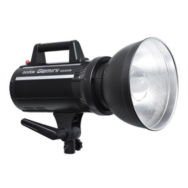 The Godox GS300II is a black studio strobe light with silver reflector, top handle and lower mounting bracket, designed for professional photography.