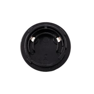 Close-up of the Viltrox AC Adapter VL400T / VL600T's round, black plastic battery holder, built for a coin battery and with two internal metal contacts for electrical connection.
