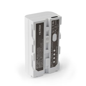 The white Viltrox NP-F550 USB-C rechargeable battery pack stands upright, with a label with specifications, certification icons and a USB-C charging port at the top.