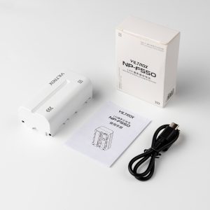 The Viltrox NP-F550 with USB-C, white product packaging, user manual and black USB cable are neatly laid out on a white surface.