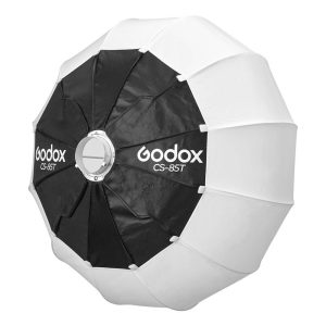 The Godox Lantern Softbox for Livestreaming CS-85T is a round, foldable parabolic softbox with black and white panels and a metal mounting ring, designed to diffuse light for photography or livestreaming.