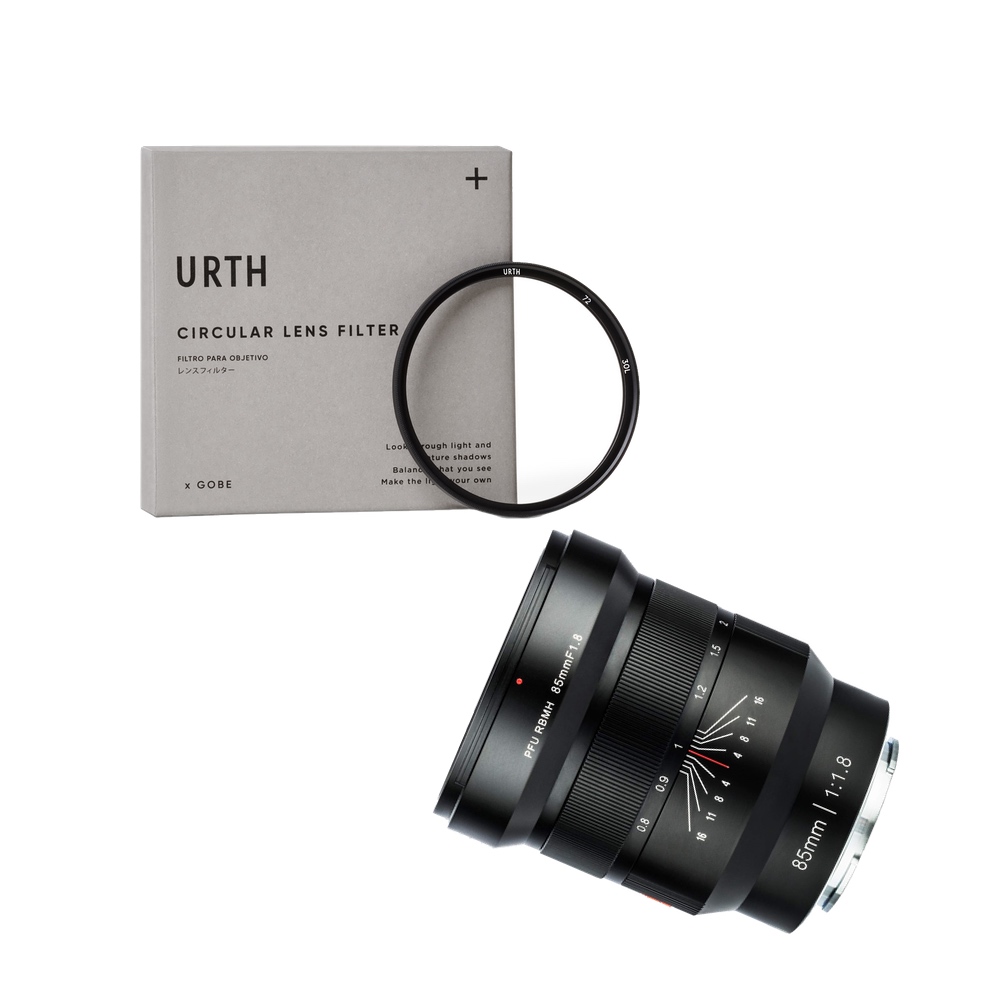 The Viltrox MF 85mm f/1.8 PFU RBMH lens for Sony and the URTH UV Plus+ filter (in grey package) appear on a white background, with aperture and focus markings.