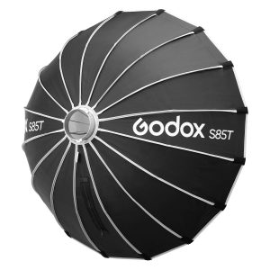 Godox Multifunctional Softbox S85T on musta softbox, jossa on hopeanväriset kylkiluut ja keskimmäinen kiinnitysreikä, joka on suunniteltu studiovalaistukseen ja valokuvaukseen.