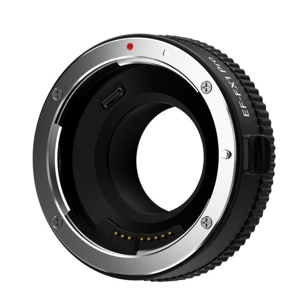 Close-up of the Viltrox EF - FX1 PRO Autofocus Adapter with metal mounts, electronic contacts and textured black handle against a white background.