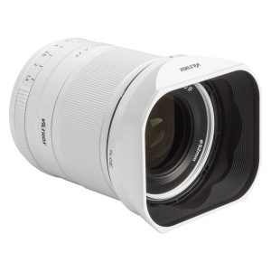 Limited edition white Viltrox AF 33mm f/1.4 lens for the Fuji X system with large square backlight hood and focal length markings on the barrel.