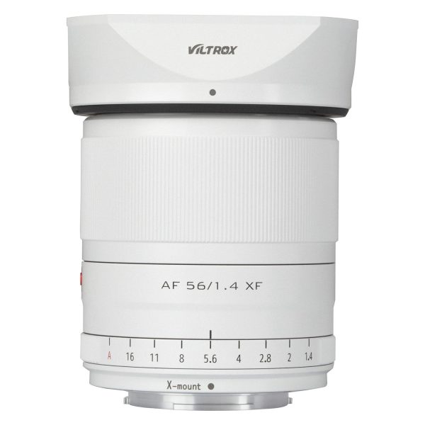 The Viltrox AF 56mm f/1.4, Fuji X (Limited Edition White) features a red and black numbered ribbed focus ring and aperture control dial against a white background with X-mount markings.