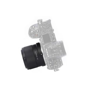 The black Viltrox AF 40mm f/2.5 lens for Nikon Z is attached to the semi-transparent outline of the Nikon camera body with a white background.