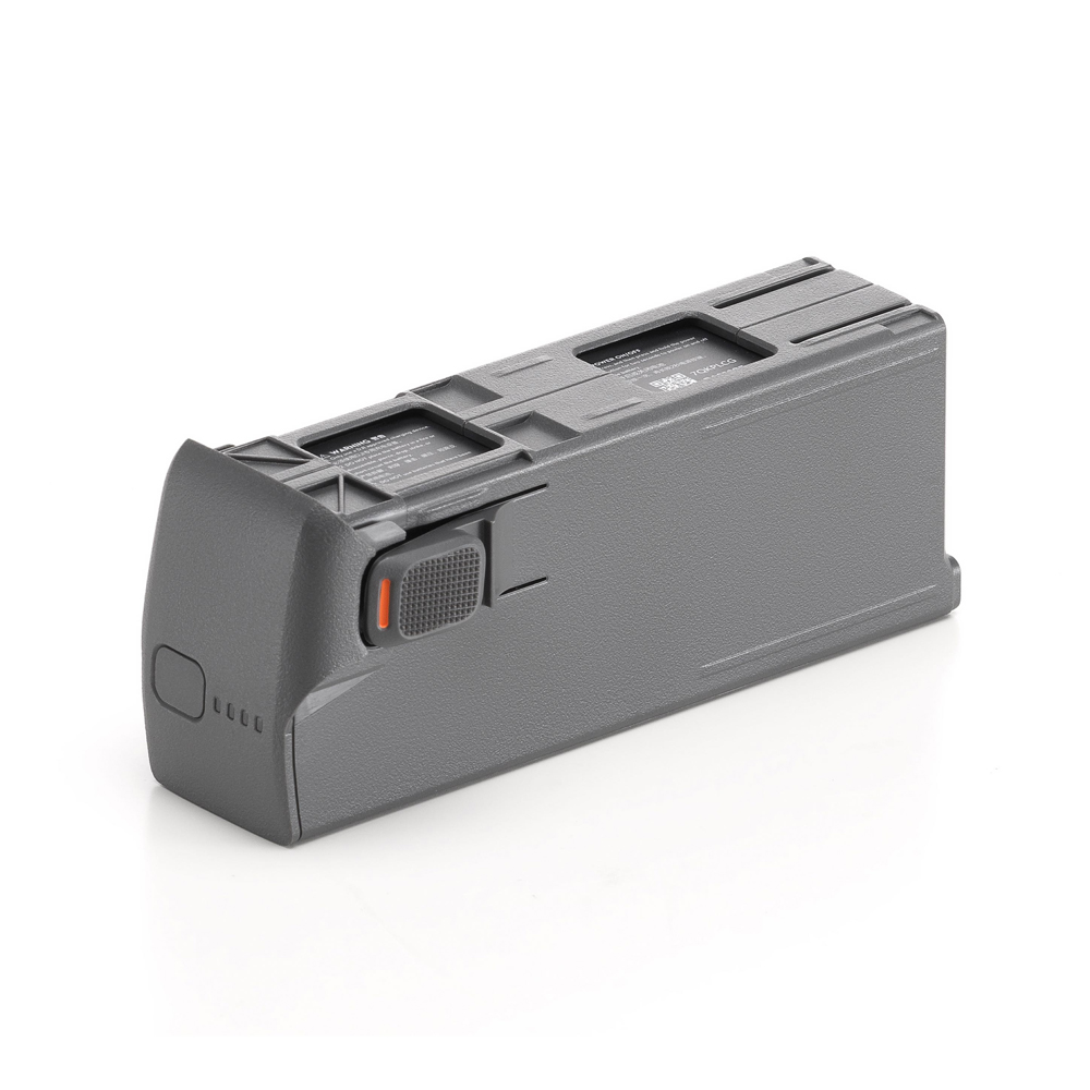 DJI Avata 2 Intelligent Flight Battery -akku on suorakulmainen, harmaa ladattava akku, jossa on kuvioitu pinta, merkkivalot ja oranssi painike valkoisella pohjalla.