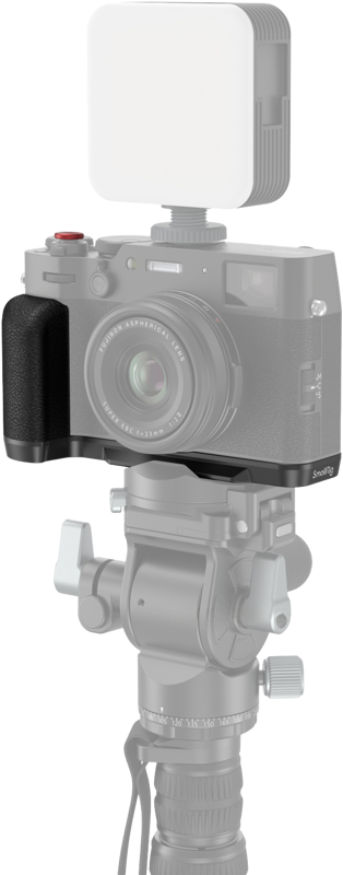 With the Fujifilm X100VI and SmallRig 4556B L-shaped grip (black) attached to the end of the tripod, the camera and accessories are in sharp focus, while the base of the tripod appears slightly faded - ideal for photographic or video shooting setups.