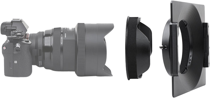On the left is the Sigma 12-24mm f/4 camera lens, with two black NiSi adapter rings for the Sigma 12-24mm f/4 filter adapter lens next to it, all lined up, as if ready for assembly.
