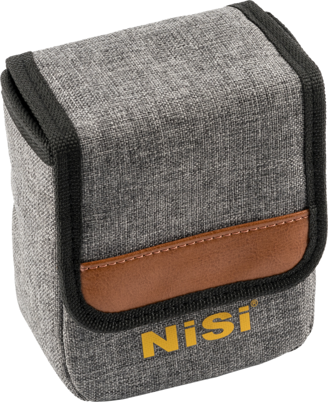 The NiSi Pouch for M75 Holder and Filters is a small, grey fabric pouch with brown leather accents, black trim, flap closure and yellow NiSi branding on the front.