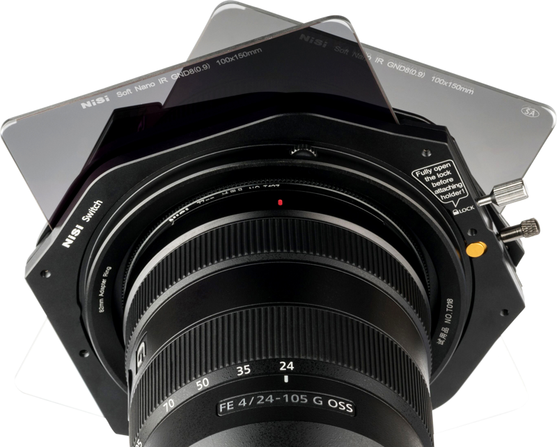 Close-up of Sony FE 24-105mm f/4 G OSS lens with NiSi Switch Filter Holder 100mm filter holder with three overlapping rectangular filters at different angles.