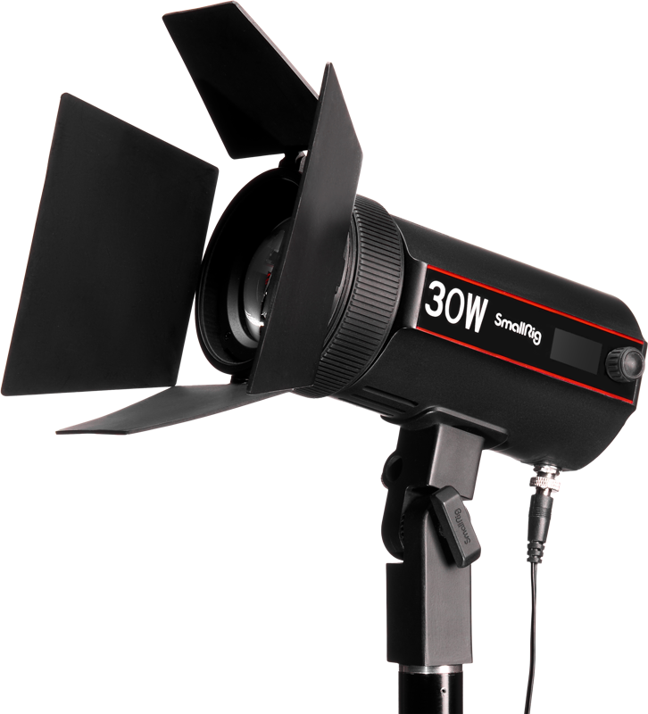 The SmallRig 4280 LED Video Light COB RC 30B (30W, black) with barn doors is mounted on a stand against a white background and the cable is connected to the light.