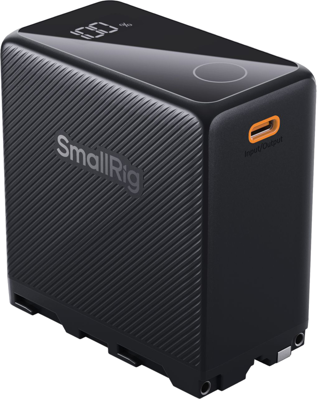 Mustassa SmallRig 4469 USB-C ladattavassa kameran akussa NP-F970 (musta) on kuvioitu sivu, latausprosenttia osoittava LED-näyttö yläosassa ja oranssi USB-C-sisääntulo-/ulostuloliitäntä etupuolella.
