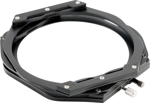 Close-up of the NiSi Switch Filter Holder 100mm, a black metal circular holder with silver screws and knobs for attaching filters to the camera lens, on a light grey background.