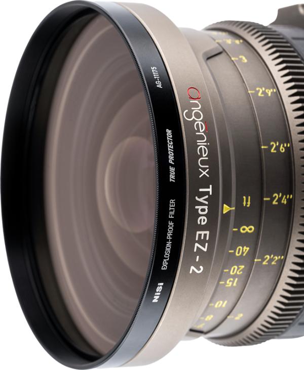 Close-up of NiSi Cine Filter Explosion Proof / True Protector AG-11175 protective filter mounted on Angénieux Type EZ-2 lens, showing sharp details of lens markings, focus and zoom rings with reflective glass surfaces.