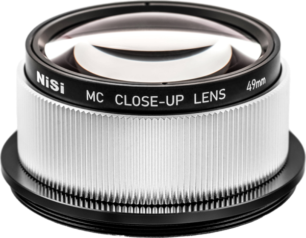 Close Up NiSi Close Up Lens Kit NC 49mm close up lens with metal brushed body and black rings with make, model and size information.