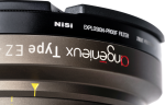 Close-up of a camera lens fitted with the NiSi Cine Filter Explosion Proof / True Protector AG-11175 for Angenieux EZ-1 & 2, showing "angenieux Type EZ" and filter markings on sharp metal and black surfaces.