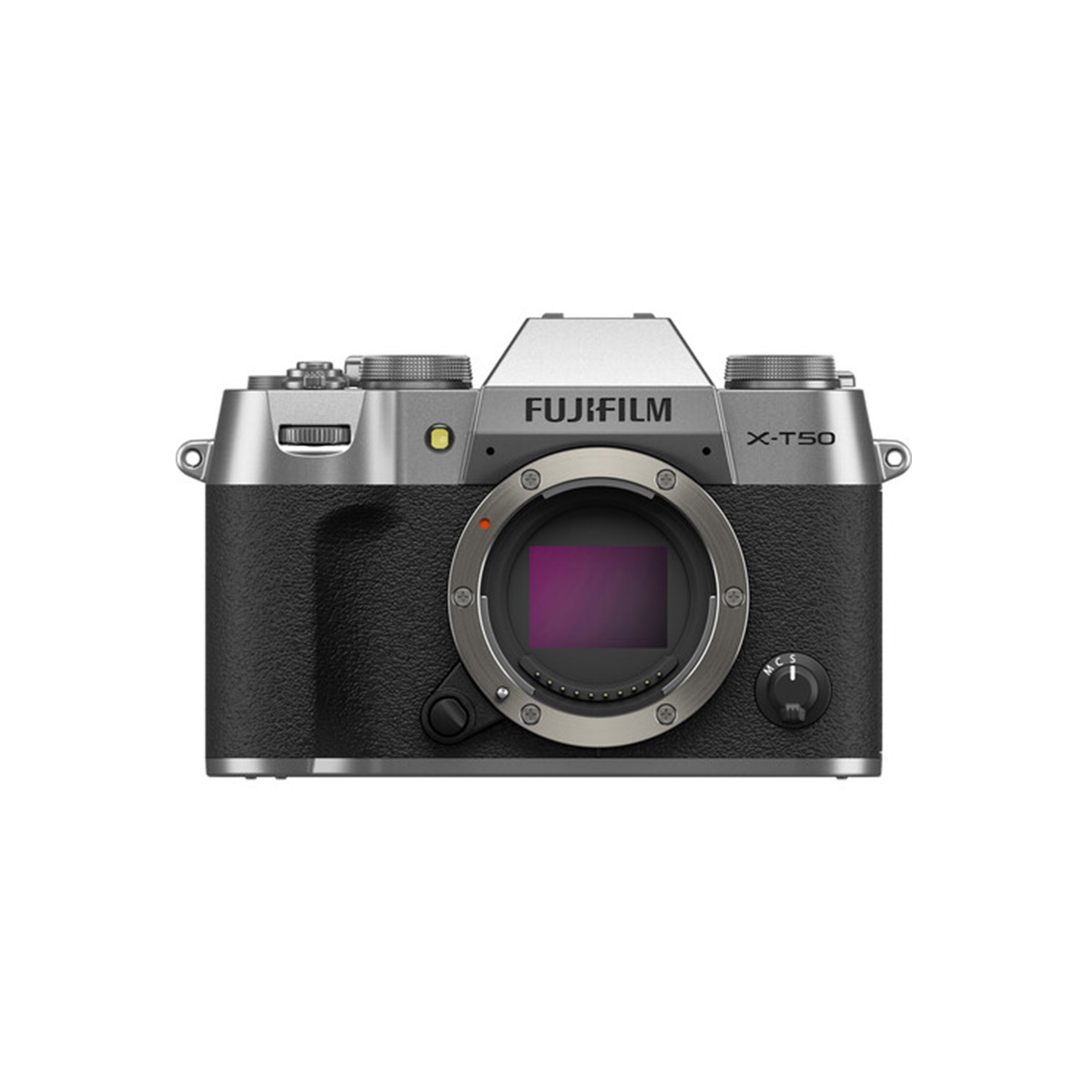 The front view of the Fujifilm X-T50 system camera, silver, shows the mirrorless camera body in silver and black, with the lens mount and the brand name visible above the sensor.