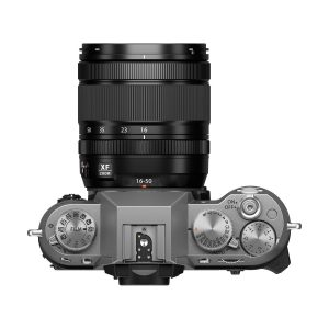 Top view of the Fujifilm X-T50 + XF 16-50mm f/2.8-4.8 (silver) digital camera with detailed dials for settings, mode and exposure, and a hot shoe mount in the centre.