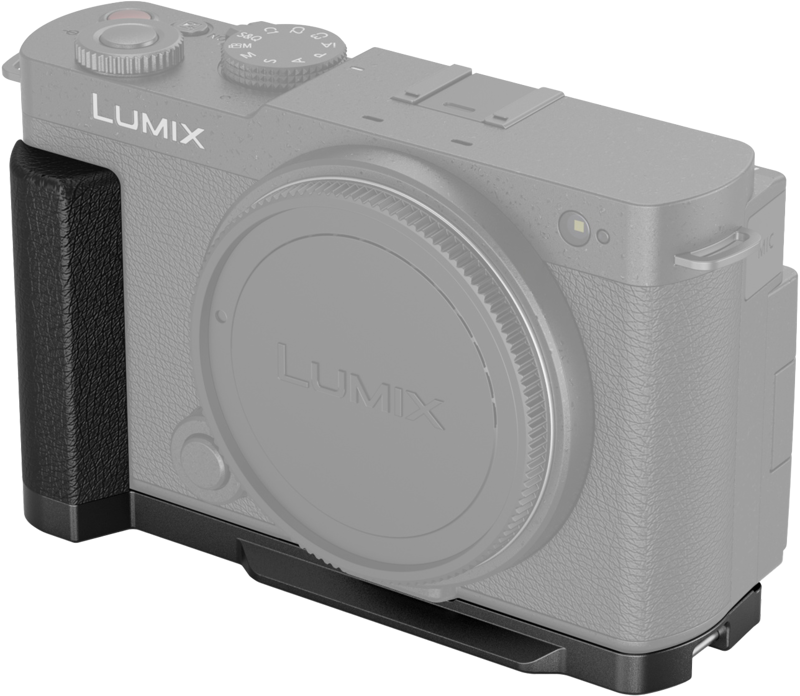 Close-up of the SmallRig 4517 L-shaped handle mounted on a Panasonic Lumix S9 camera, showing its textured black handle on the left against a light background.