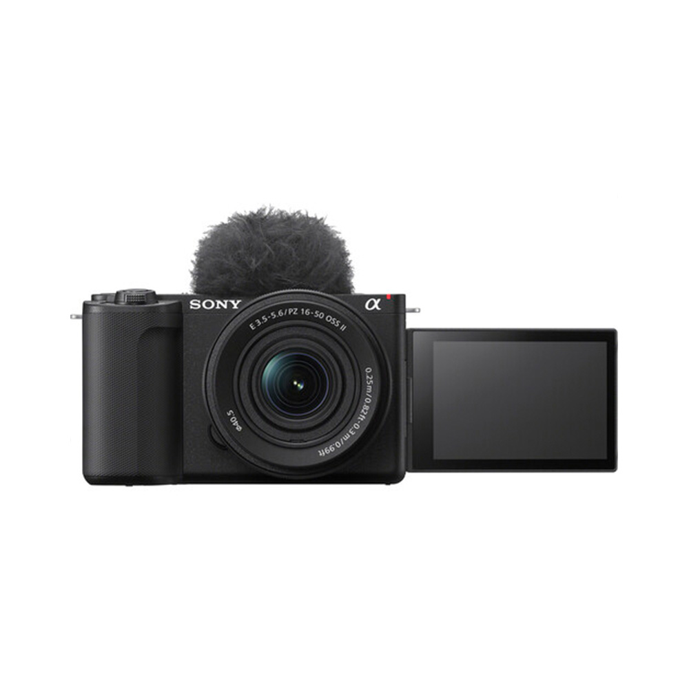 The Sony ZV-E10 II, with E PZ 16-50mm f/3.5-5.6 OSS II lens and a fur-selective microphone, appears against a white background, with its flip-out screen facing forwards.