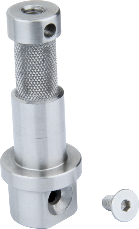 Kupo KS-346 5/8" (16mm) Baby Stud for Rock's Arm on metallinen sylinterimäinen työkalu, jossa on nupukoitu kahva, tasainen pyöreä pohja ja useita reikiä, kuvassa pienen kuusiokoloruuvin vieressä tavallisella pohjalla.