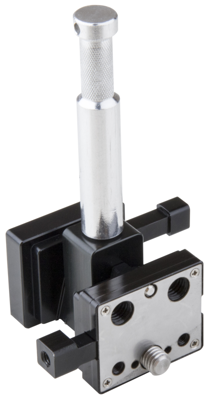 The Kupo KS-275 Dual V-Lock Adapter is a metal and black plastic component with a cylindrical handle, square base, front plate with screw holes and two round slots.