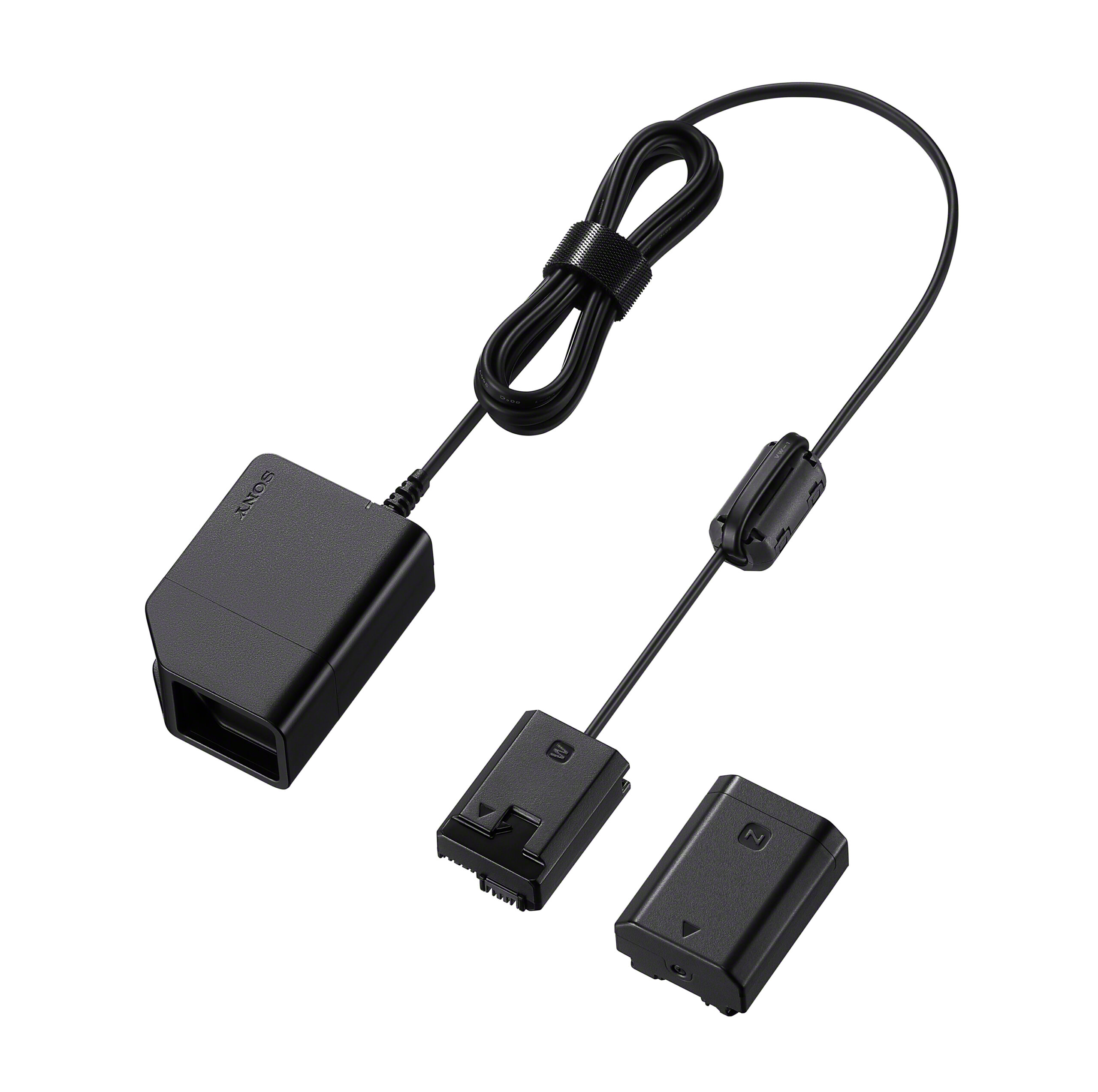 The Sony DC-C1 power adapter includes a black camera power adapter kit with two battery-shaped adapters and a power cord with a wall plug, all on a white background.