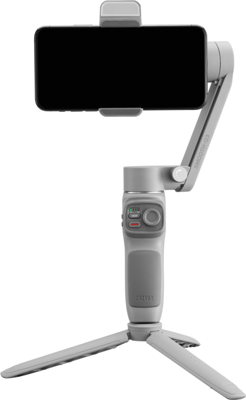 Zhiyun Mobile Gimbal Smooth Q3 on harmaa käsikäyttöinen älypuhelimen vakain, jossa on ohjauspainikkeet ja pieni jalustan jalusta, joka tukee puhelimen vaakasuoraa kiinnitystä vakaaseen videokuvaukseen ja valokuvaukseen.