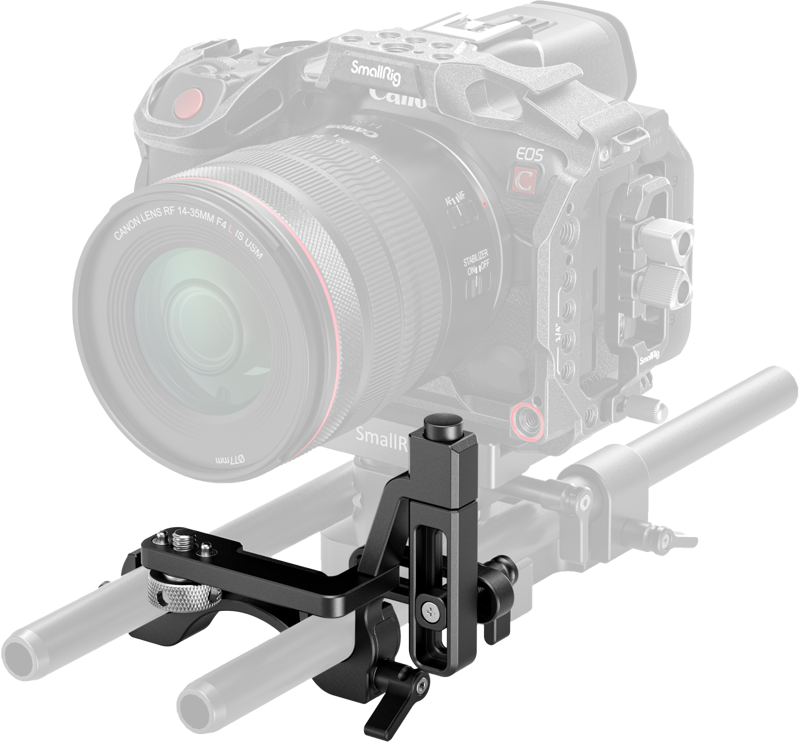 SmallRig 4414 Swing-Away Support, musta metallinen linssitukikiinnike, näkyy asennettuna kahteen 15 mm:n tankoon suurella objektiivilla varustetun ammattikäyttöön tarkoitetun Canon-kameran alle, ja se on korostettu osittain läpinäkyväksi sen sijainnin ja rakenteen paljastamiseksi.